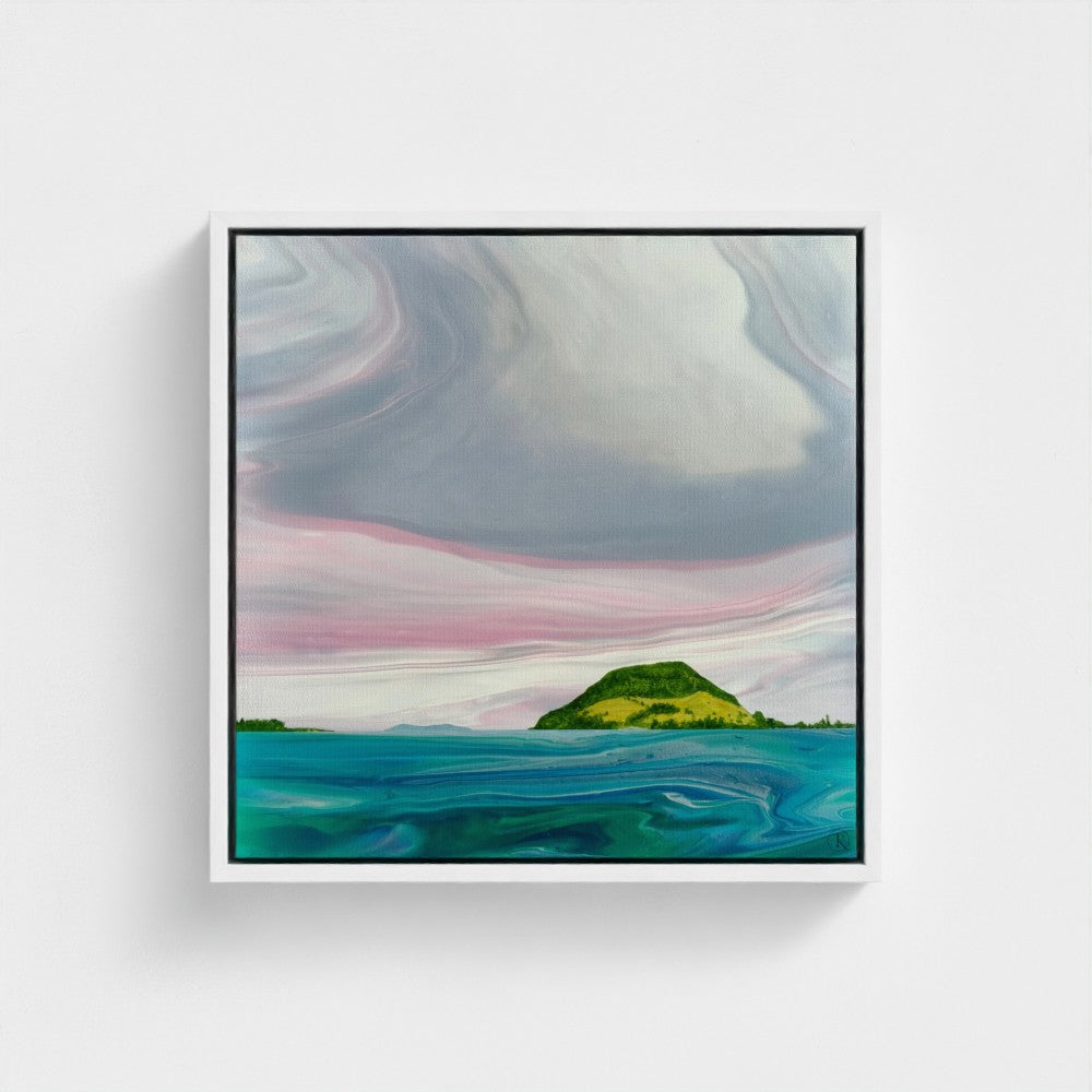 Coastal scene in a floating white frame, with textured ocean and a swirling sky, and a view of Mt Maunganui with Mayor Island in the distance.