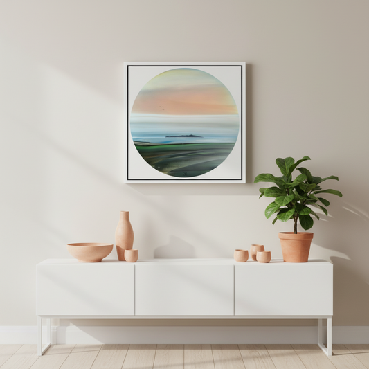 Modern interior with a white console table, decorative items, and a circular artwork on the wall.